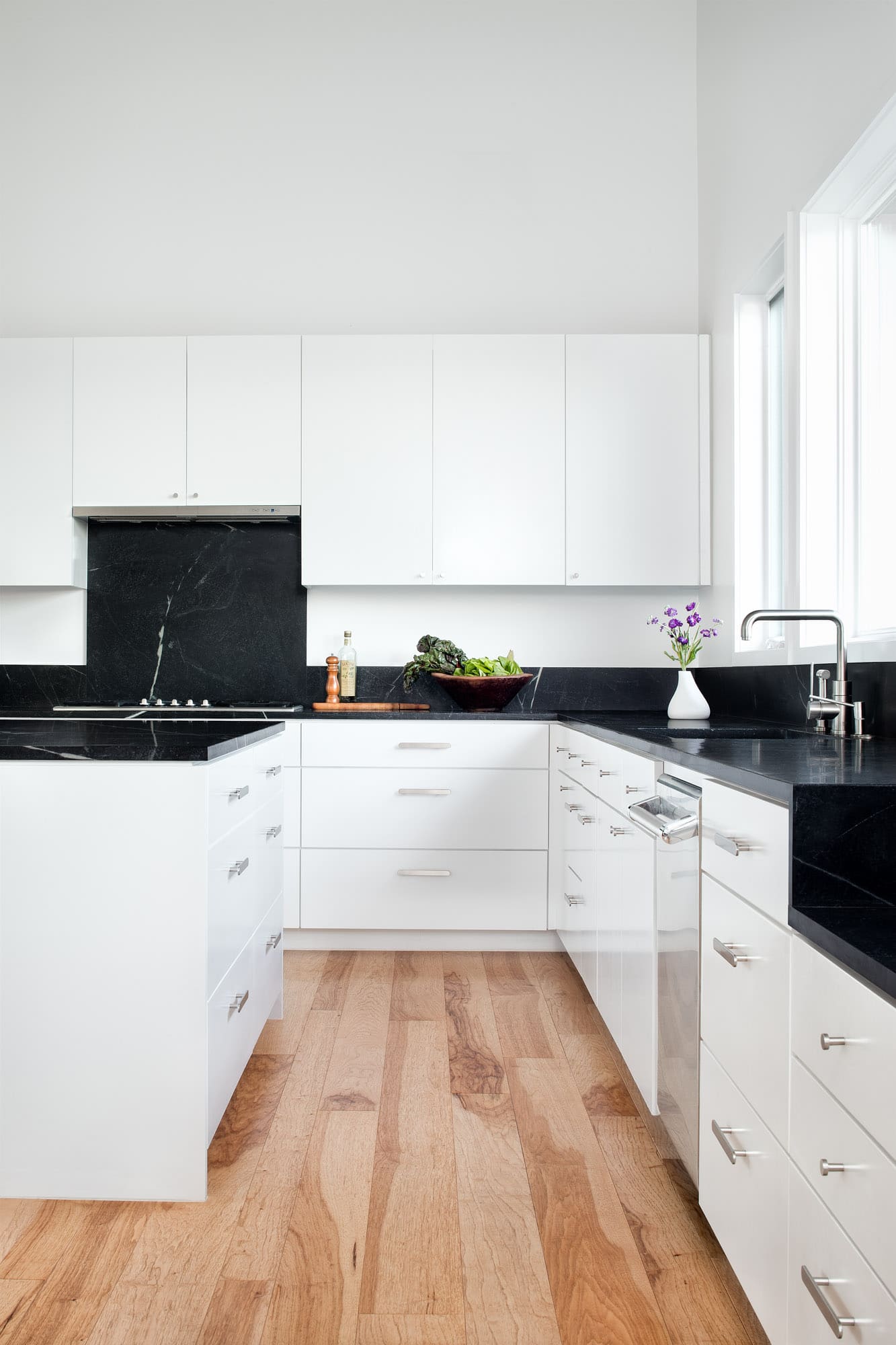 Sleek and modern kitchen design at Self-sustaining home in Wimberley Texas