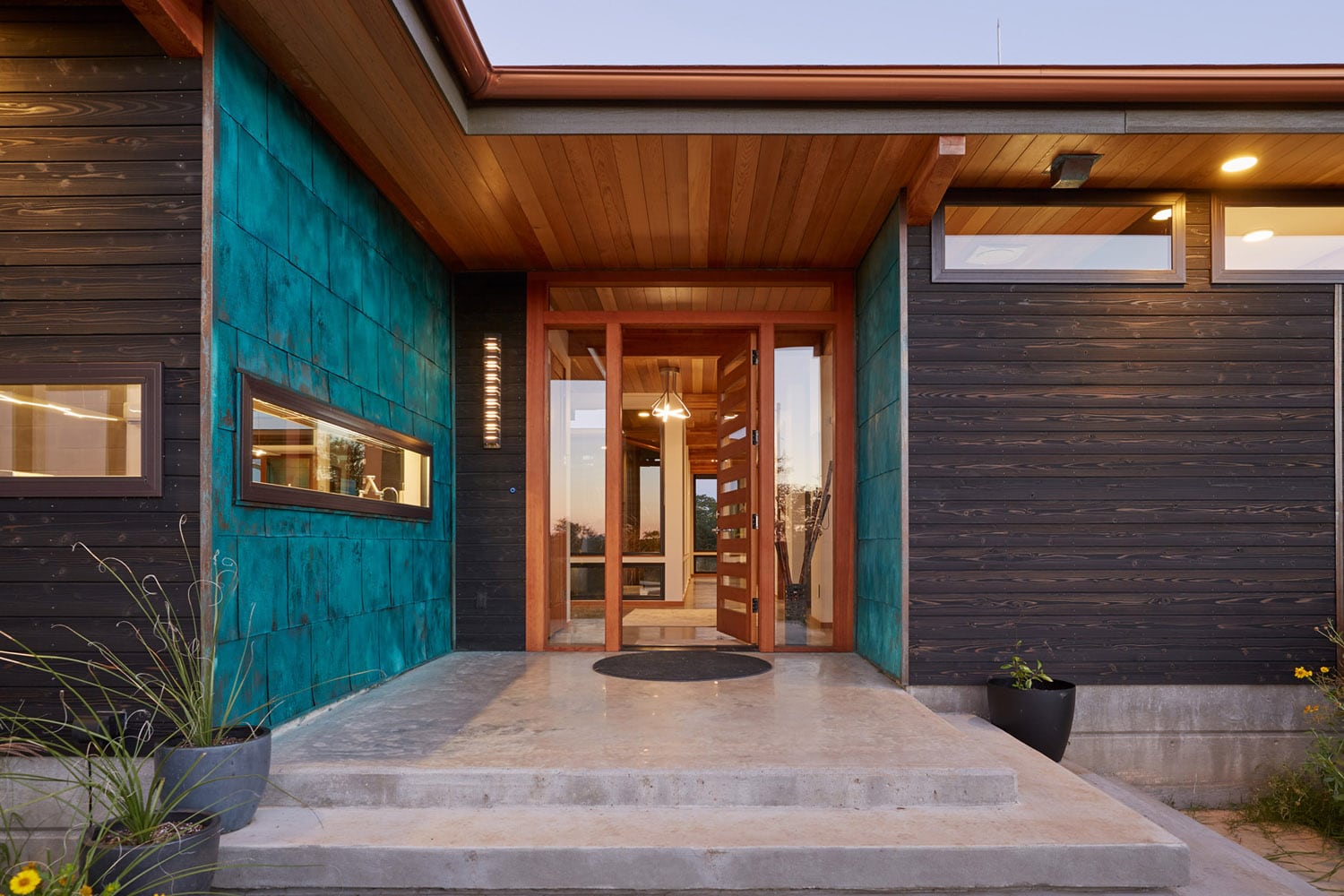 Porch Jeff Derebery’s custom Lindal Hestia home in the Texas Hill Country, Johnson City