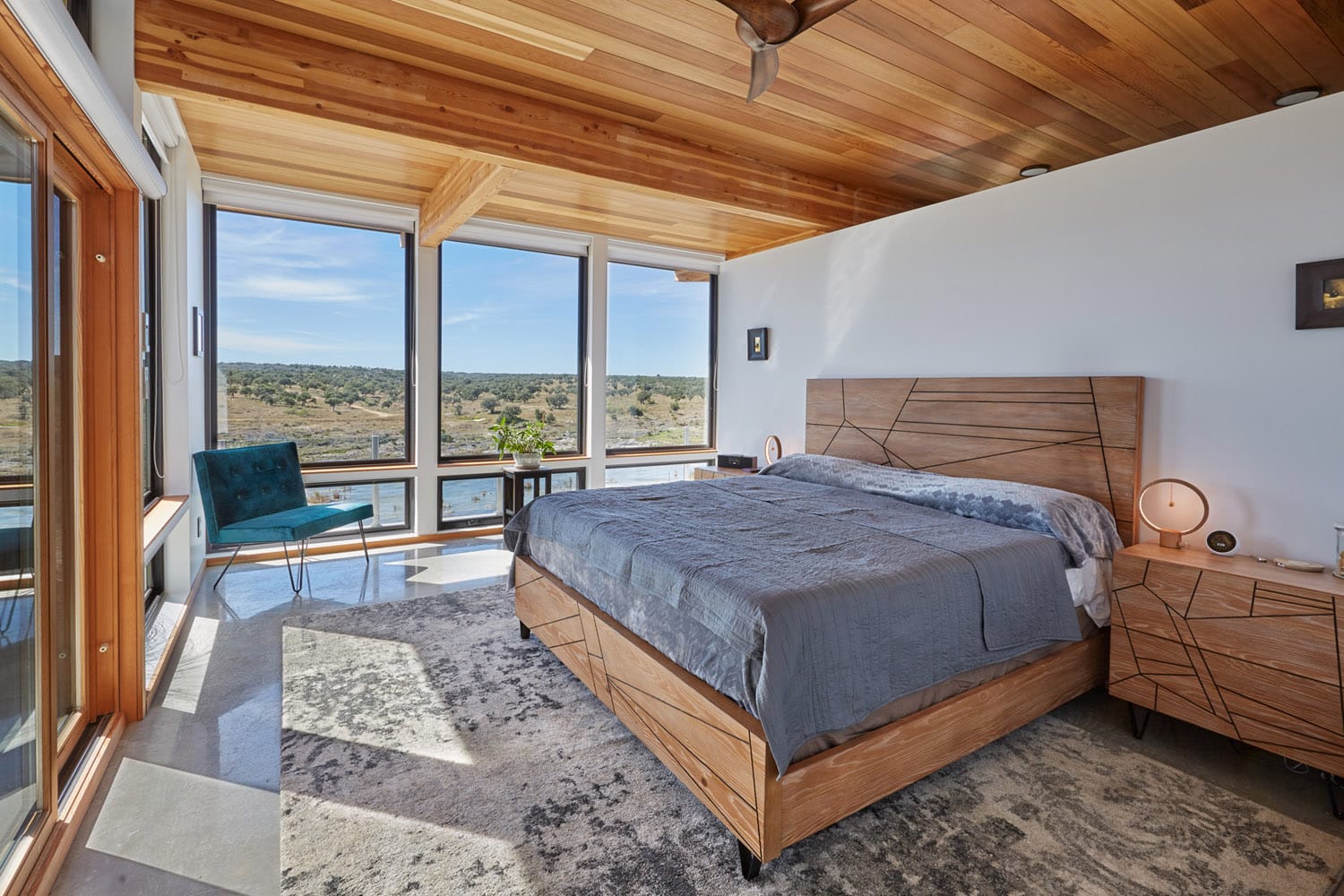 Master bedroom at Jeff Derebery’s custom Lindal Hestia home in the Texas Hill Country, Johnson City