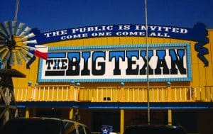 The Big Texan exterior, Billy Hathorn|Wikipedia.org, CC BY-SA 3.0. Interior, Valerie Everett|Flickr.com/people/66742614@N00, CC BY 2.0.