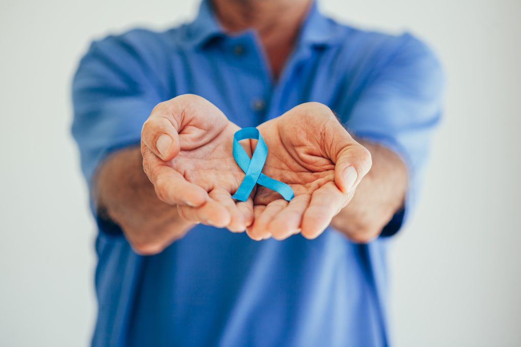 Prostate Cancer Awareness Man with light Blue Ribbon for supporting people living and illness Men Healthcare and World cancer day concept