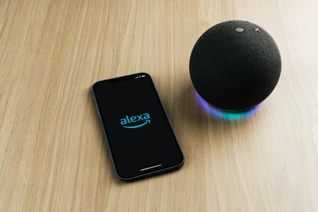 Amazon Echo with Alexa, Smart speaker and virtual assistant from Amazon connected to smartphone app. 