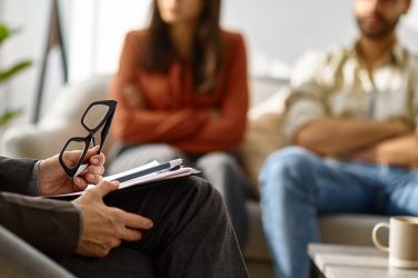 Married couple having psychological consultation in office; Talking Points