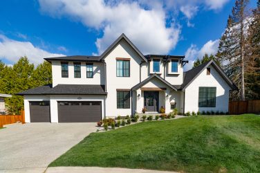 Wide Angle Shot of a Big white beautiful house in the suburbs