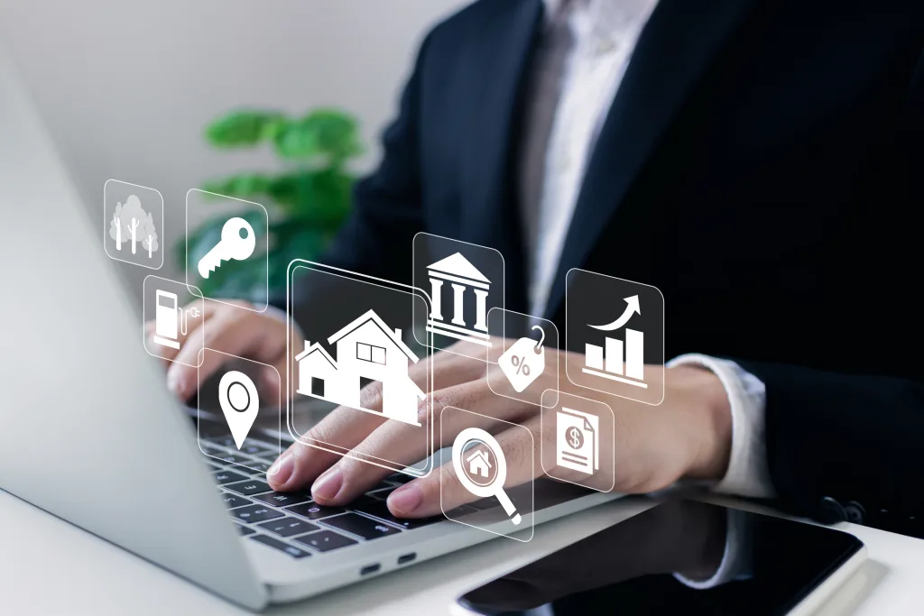 Real estate agent concept Broker manager using laptop contract to customer for buying house, Investment in business property insurance and security, home loan contract, buy and sell house