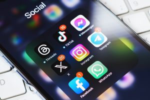 iphone screen showing popular social media apps
