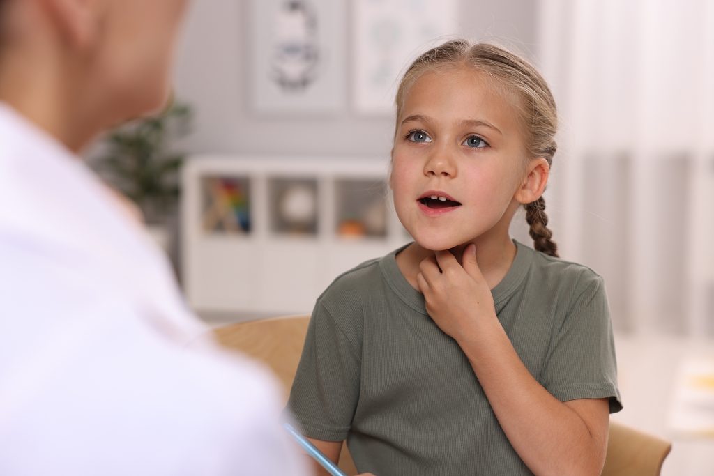 Dyslexia treatment Speech therapist working with girl in room Dyslexia treatment Speech therapist working with girl in room