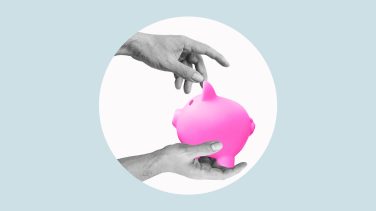 Piggy bank in the hand protected by another hand concept for protecting your assets, financial help and insurance Asset protection; unlocking the power of trusts
