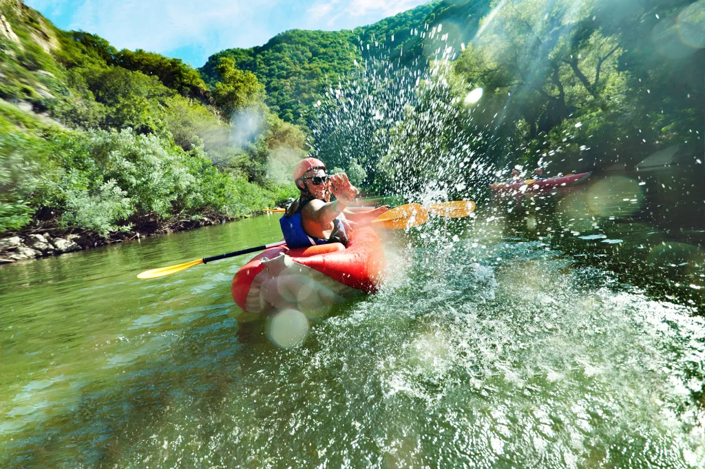 in river canoe splashes Row Your Boat | Paddling the Brazos River; in river canoe splashes