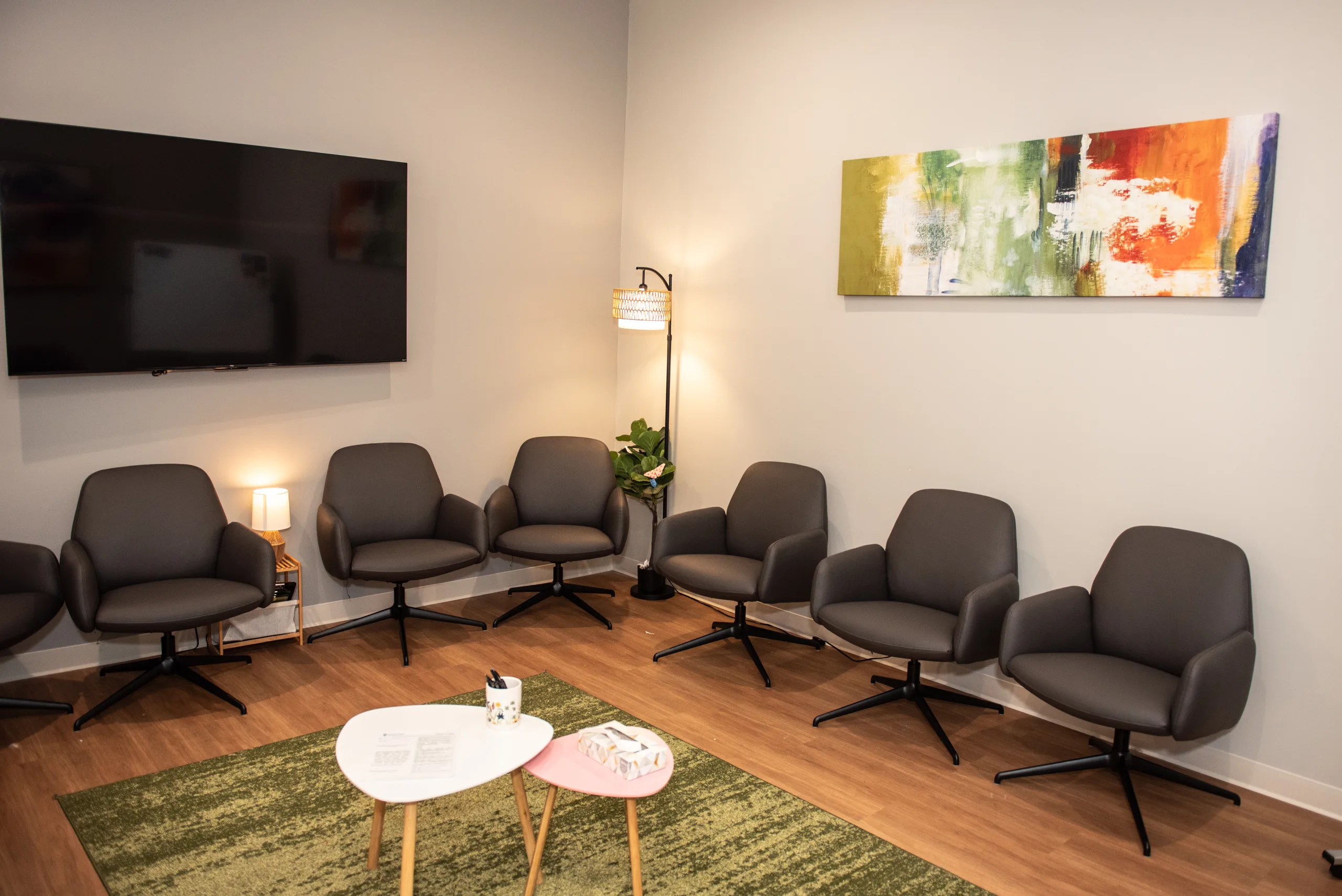 Brown office chairs line the walls of the waiting room at Connections Wellness Group – Frisco Heather Aje, MA, LPC