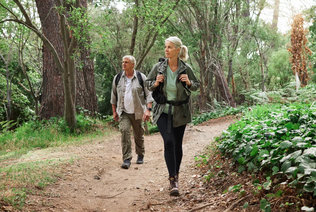Your Private Mountain Retreat Awaits Timber Ridge Estates of Oklahoma Nature,,Forest,And,Senior,Couple,Hiking,For,Health,,Wellness,And