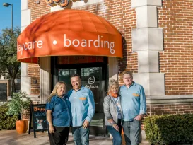 MAIN Owners at front door Edit