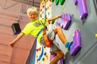 UA climbing wall little boy