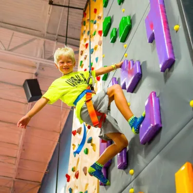 UA climbing wall little boy