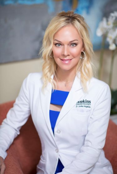 dr hopkins headshot with lab coat